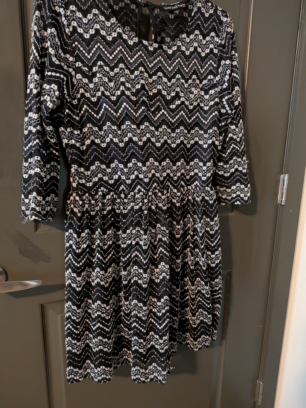 black and white chevron striped BeBop mini dress with 3/4 sleeves.